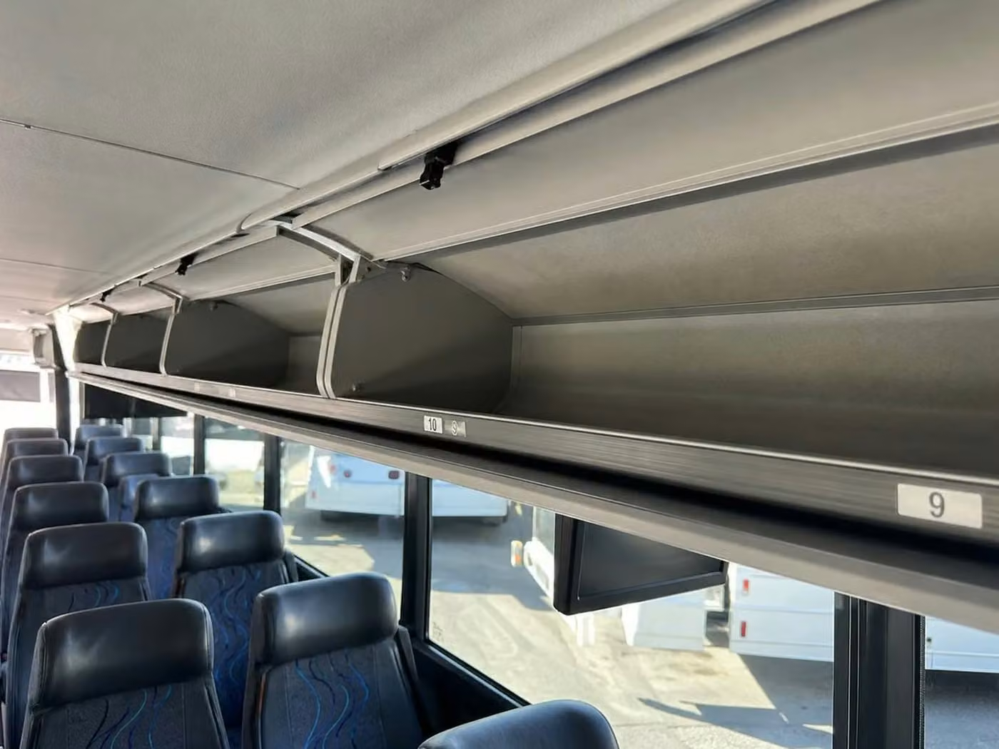 brooklyn center charter bus overhead storage